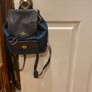 Mini Coach Backpack.